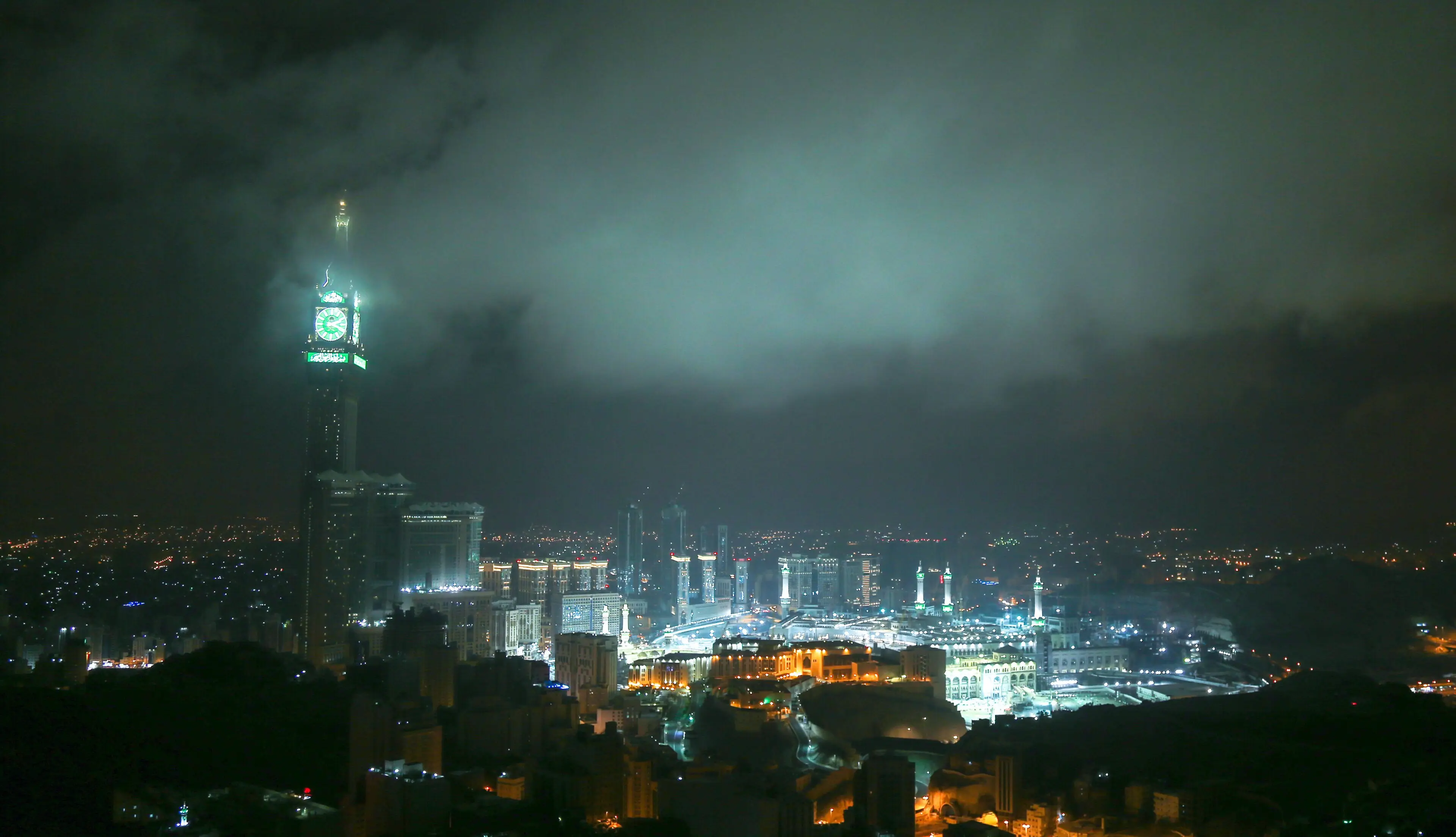Clock tower and Masjid al-Haram at night